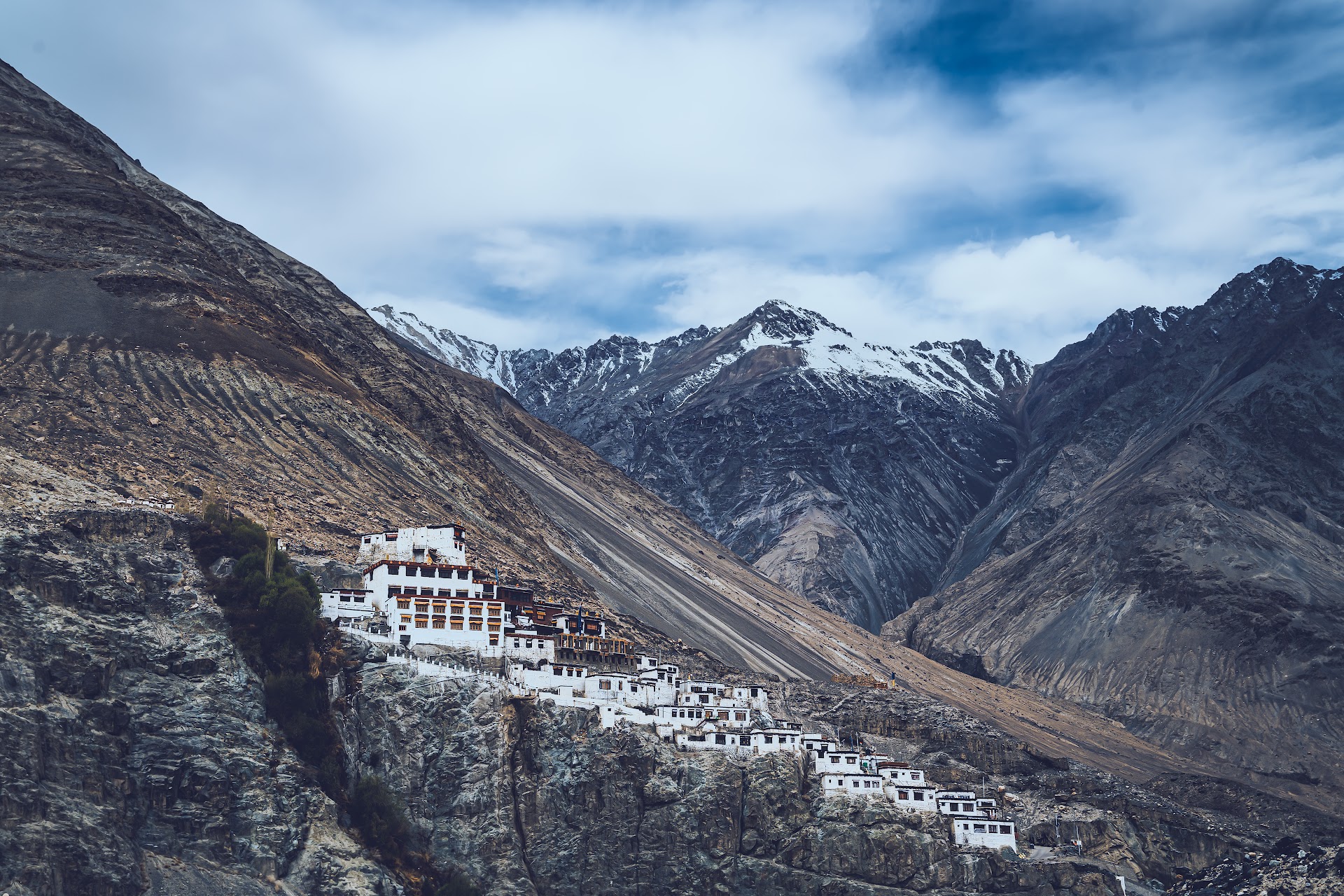Himalayan monastery in Ladakh against mountain sky